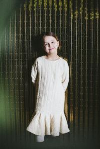 A child model with and MUKA VA Mini collection dress